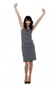 Woman happy with arms up celebration stockimages